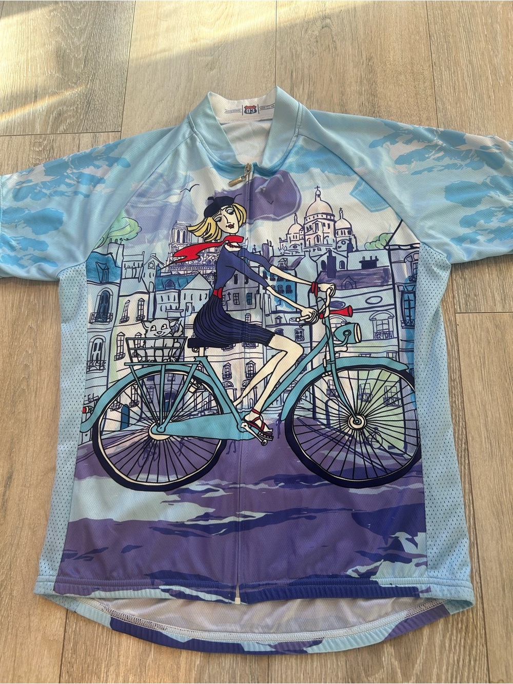 Women’s Light Blue Graphic 83 Sportswear Cycling Jersey - Parisian Girl on Bike